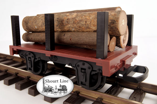 G Scale HLW 15061 Log Car with 6 Load Stakes Securing a Real Wood Log Load NEW left front view on track