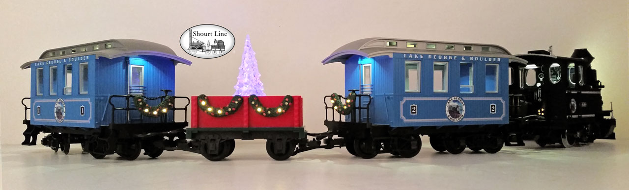 G Scale Shourt Line LGB 72327 HLW 15105 G Scale Ultimate Hybrid 71 LED Passenger Christmas Train Starter Set right side off track 71 LEDs on