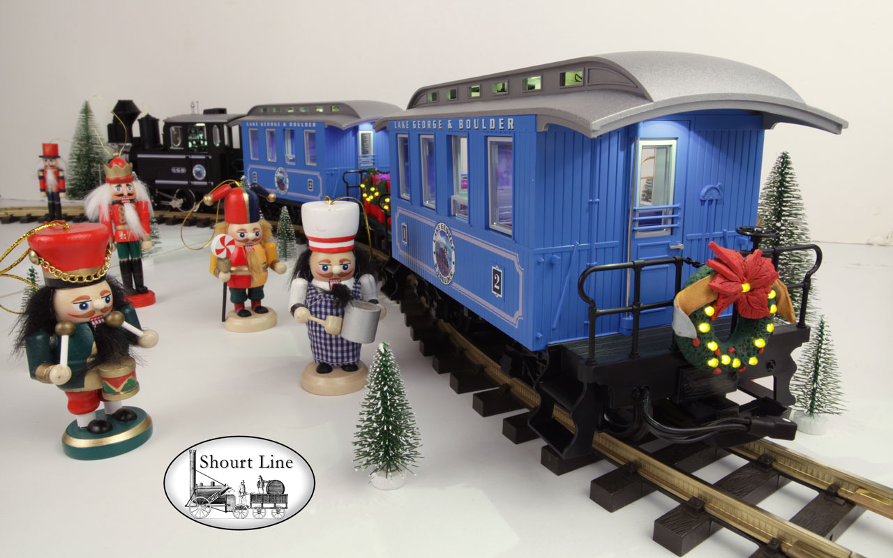 G Scale Shourt Line LGB 72327 HLW 15105 G Scale Ultimate Hybrid 71 LED Passenger Christmas Train Starter Set rear left side low angle