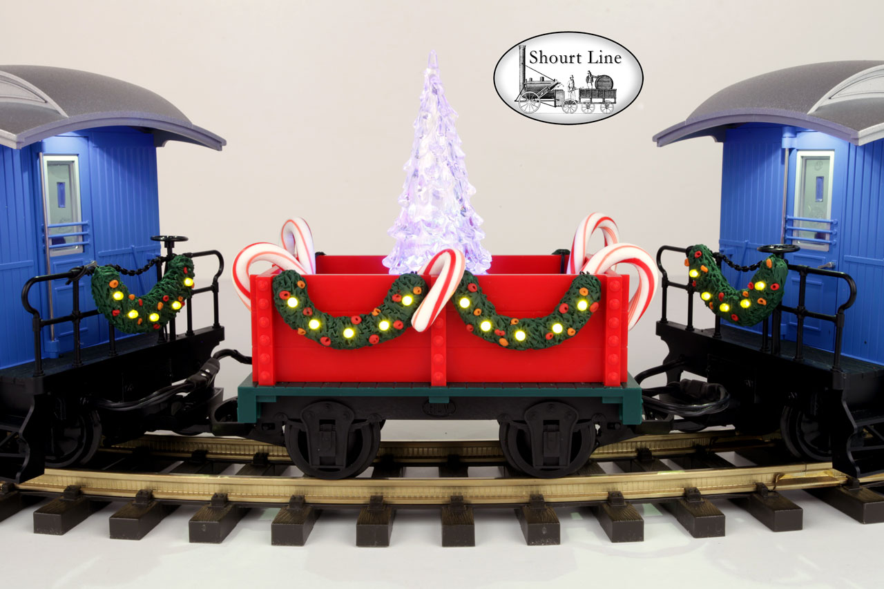 G Scale Shourt Line LGB 72327 HLW 15105 G Scale Ultimate Hybrid 71 LED Passenger Christmas Train Starter Set Hartland Gondola rt side with Christmas Garland by ShourtLine.com